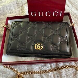 Gucci Black Leather Clutch with Gold Chain